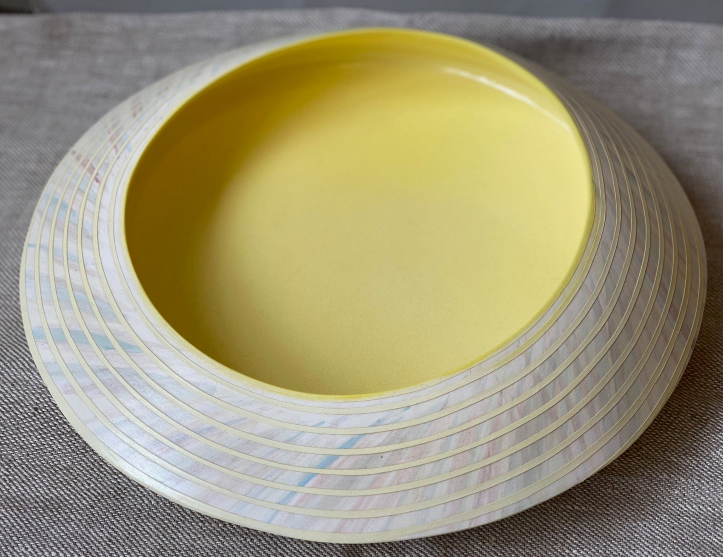 Striated disc bowl in yellow