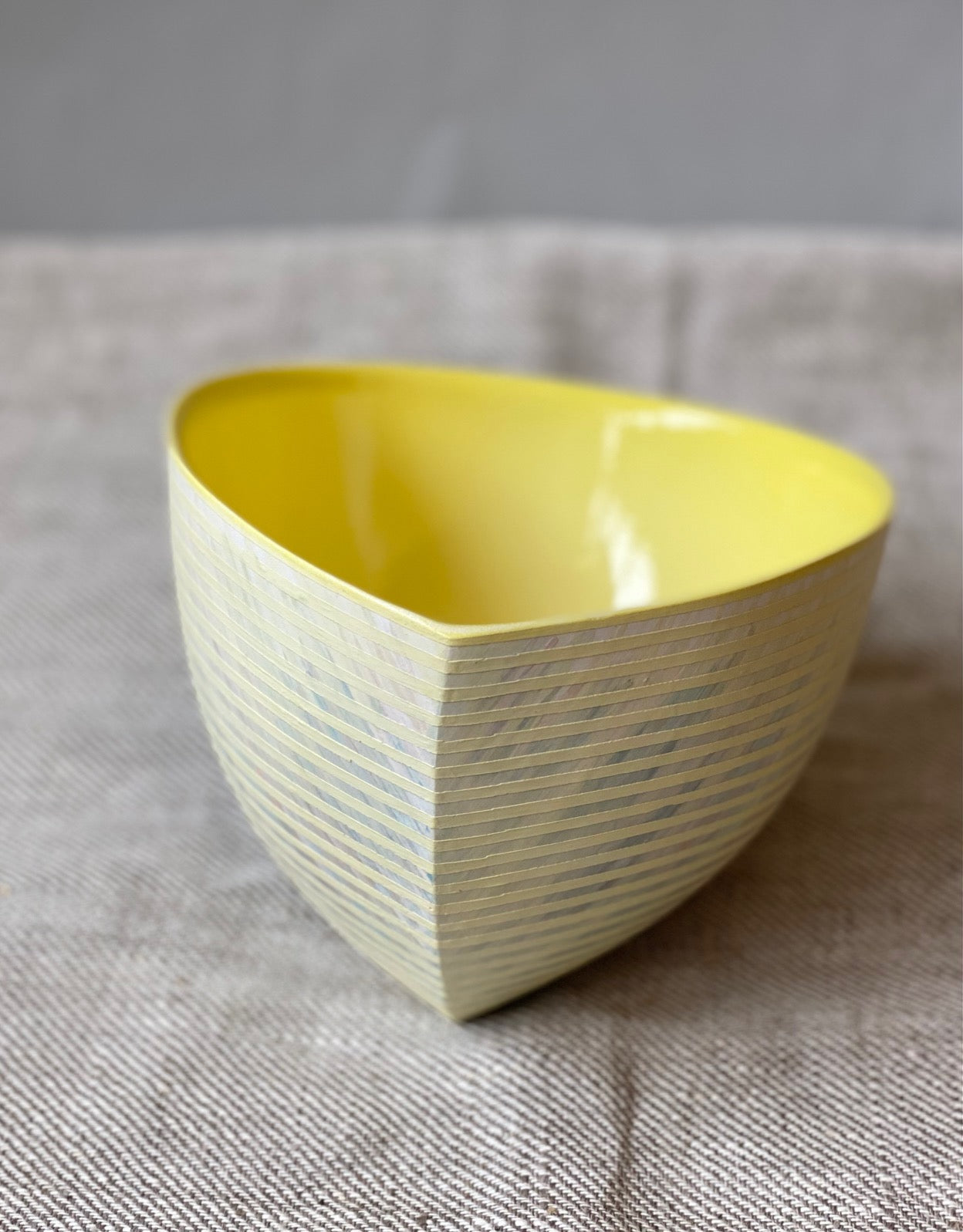 Medium sloping form vessel in yellow