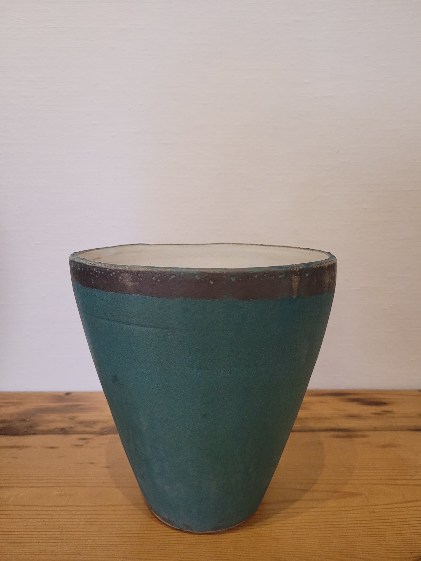 Large cone shaped turquoise vessel