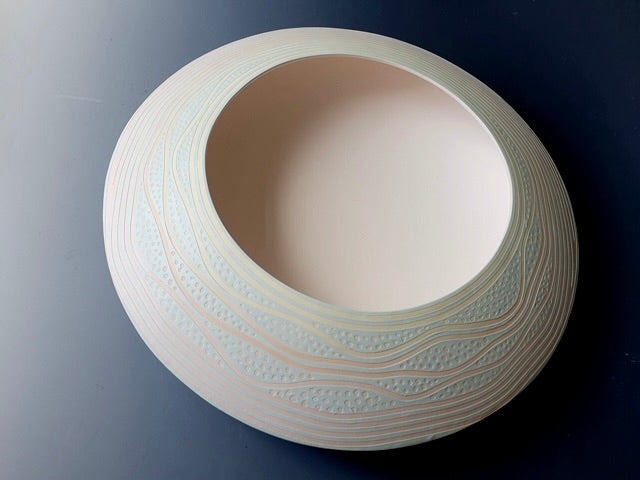 Shallow disc - pale blue/pink, fossils design