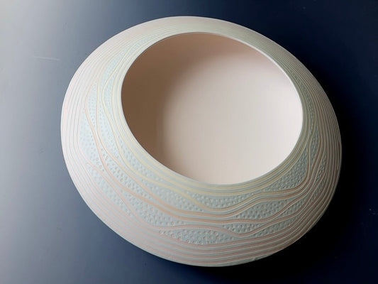 Shallow disc - pale blue/pink, fossils design