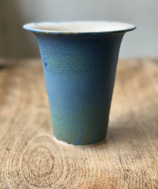 Blue vessel with green