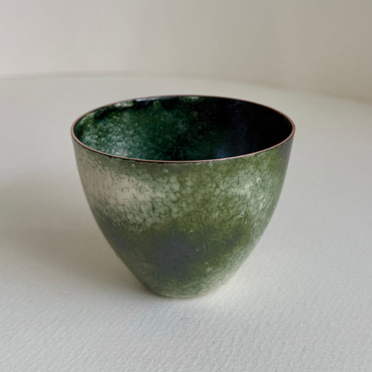 small decorative vessel in copper and enamel