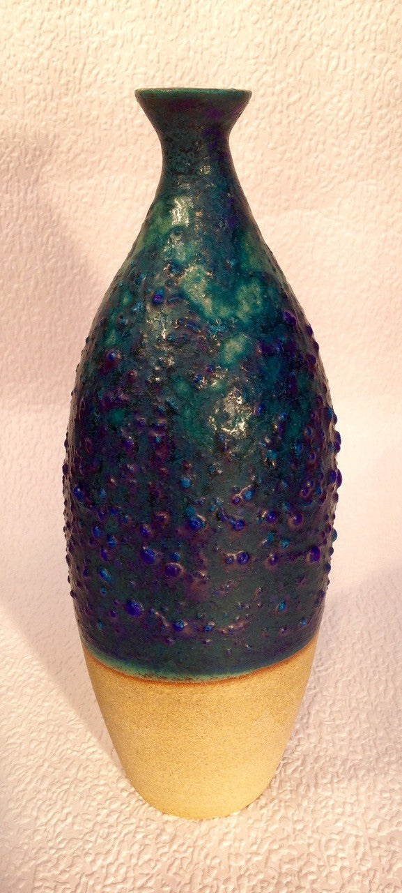 Narrow vase with textured glaze finish