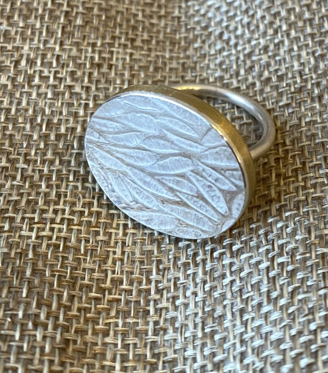 Intaglio bigger oval ring horizontal, silver with brass sides and reverse